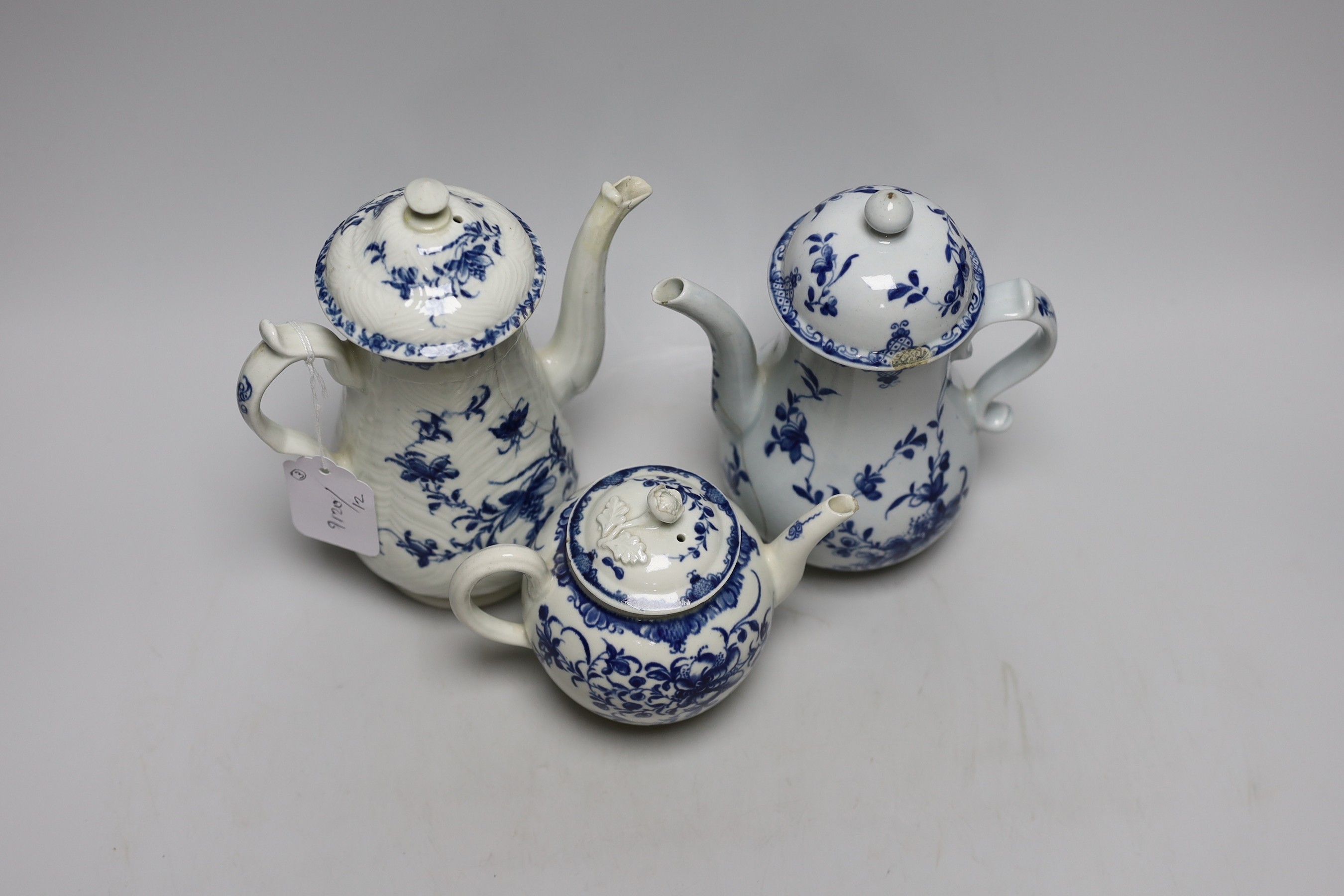 Two 18th century Worcester Mansfield pattern coffee pots and a similar teapot, (all with covers) tallest 22cms high